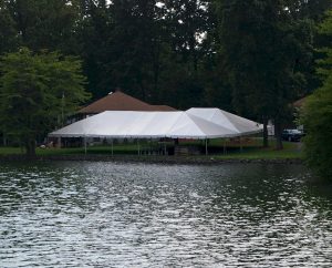 30'x60' Frame Tent with married 30'x40' Frame Tent by lake