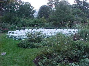 White Party Chairs set for Wedding Ceremony in a Garden