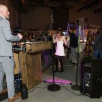 DJ On Stage with people Dancing