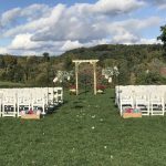 White Party Chairs at Wedding Ceremony